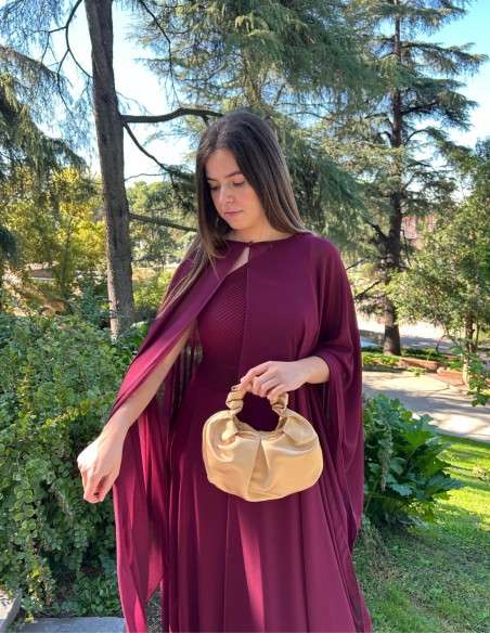 Multi-position guest cape in garnet color.