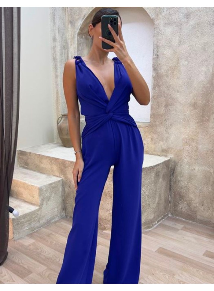 Designer party jumpsuit with bow detail at the waist