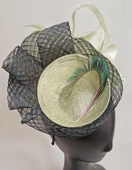 Headdress in green and navy blue.
