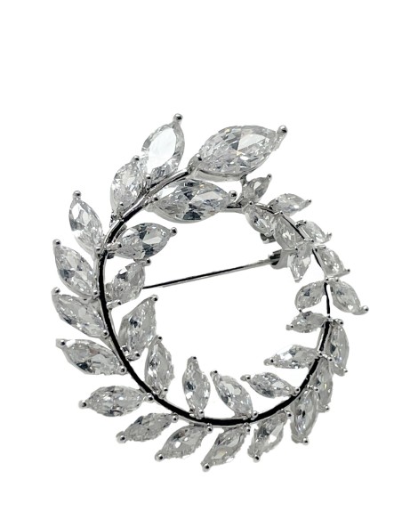 Round silver plated brooch with leaf-shaped crystals