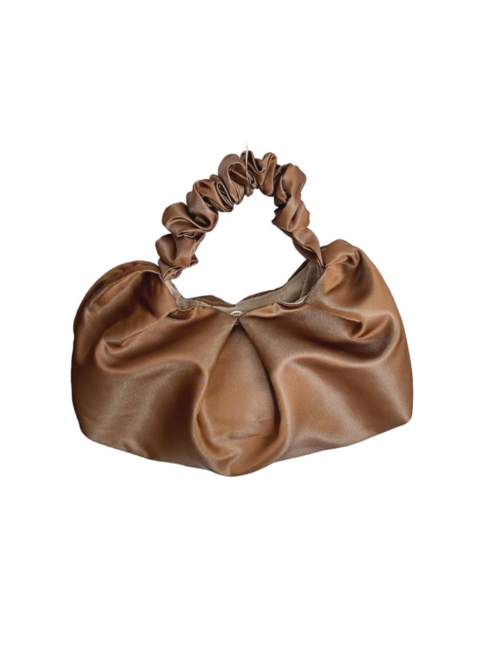 Handbag with crumpled handle in mikado