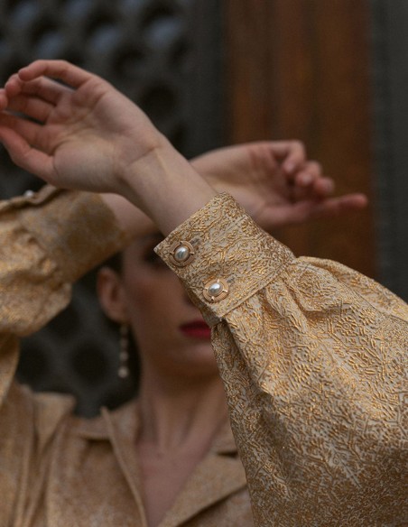 Golden printed party blouse with puffed sleeves