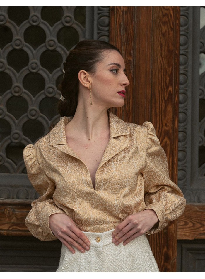 Golden printed party blouse with puffed sleeves