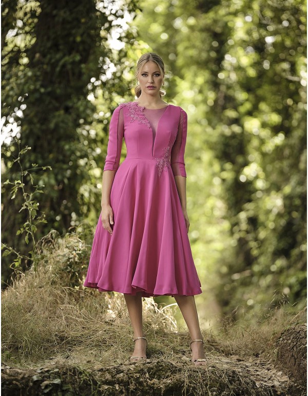 Cocktail dress with sheer bodice and flared skirt