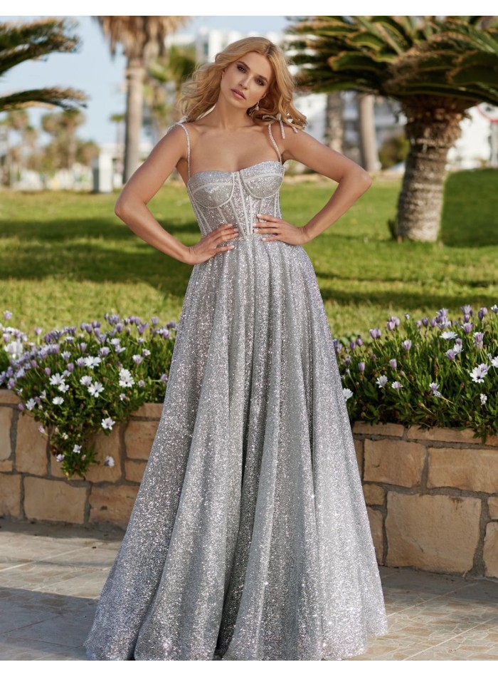 Long party dress with shiny fabric and corset bodice