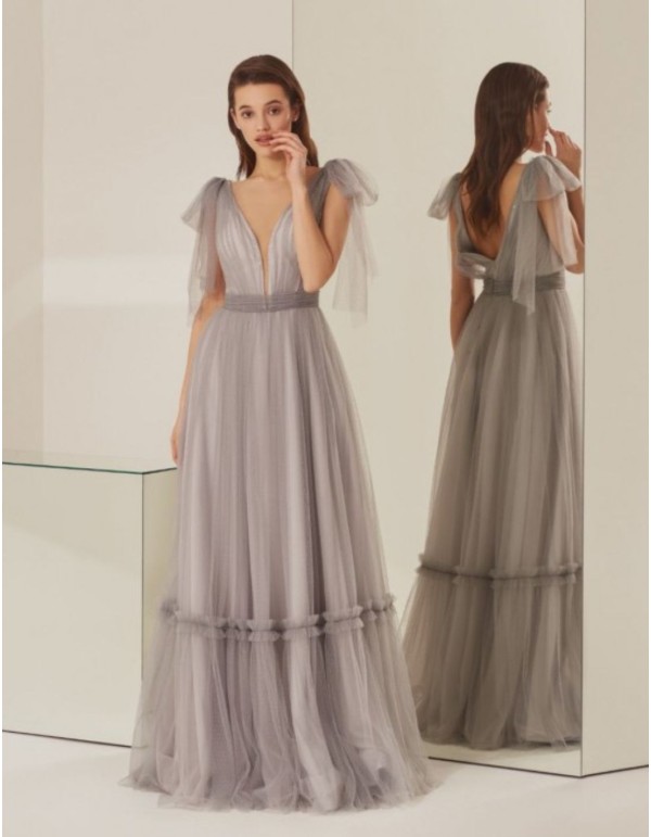 Long party dress with layers of tulle and bows
