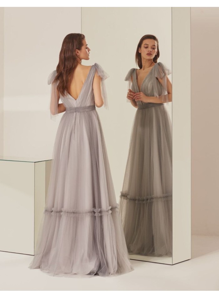Long party dress with layers of tulle and bows