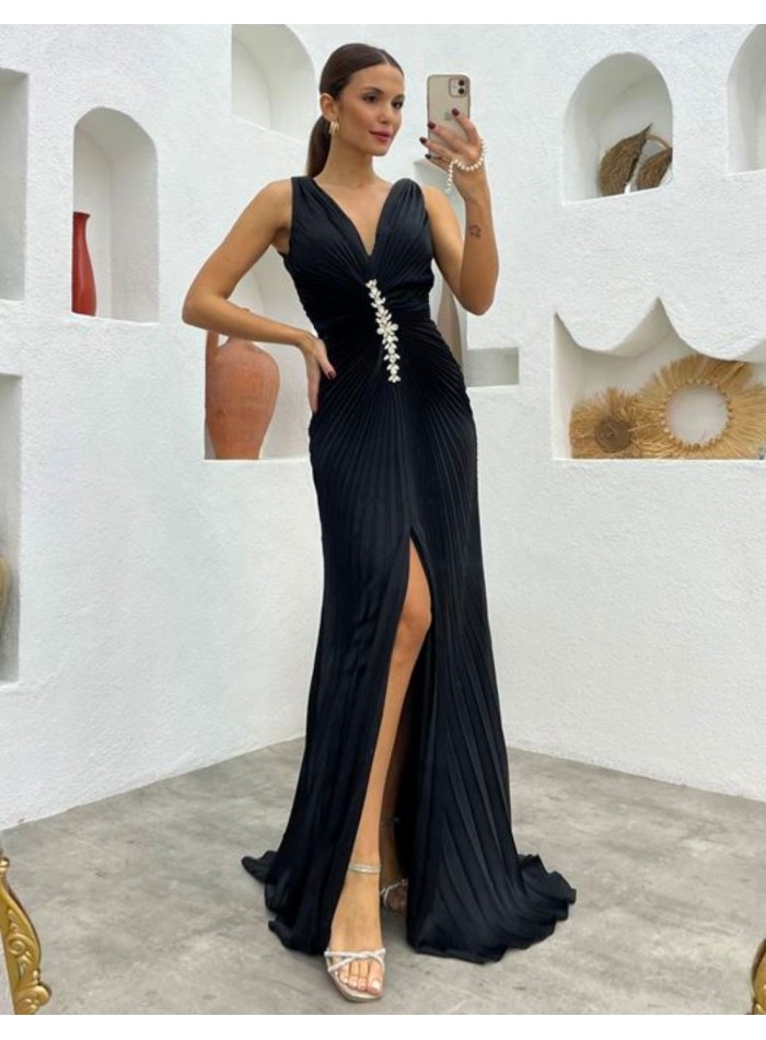 Long pleated gown with central beading detail