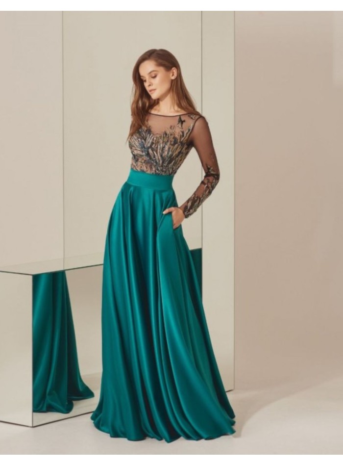 Turquoise rhinestone bodysuit and satin long skirt
