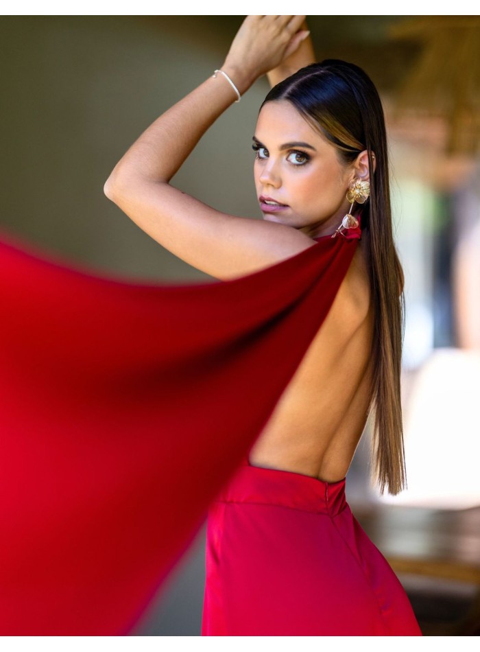 Long red party dress with halter neckline and cape