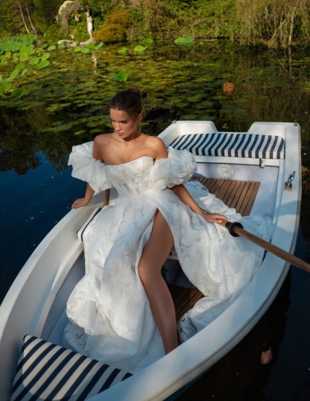 Ivory A-line wedding dress with a straight neckline, V-back and slit