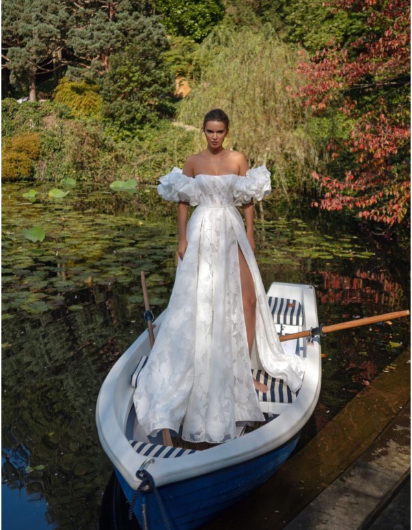 Ivory A-line wedding dress with a straight neckline,... 2