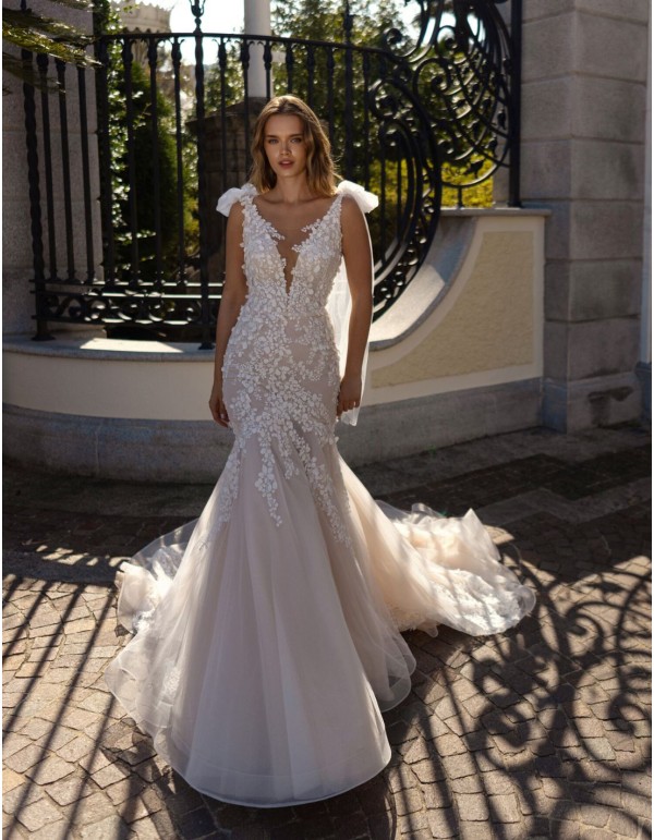 Nude wedding dress with V-neckline and V-back, lace and bows