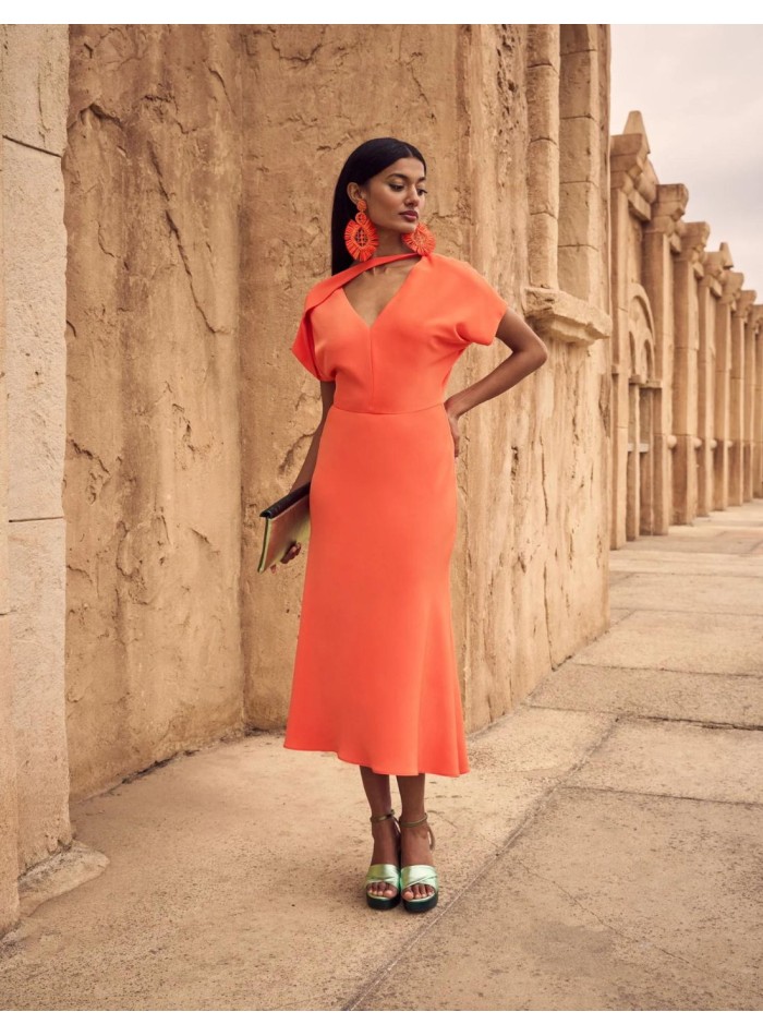 Orange midi party dress for guests.