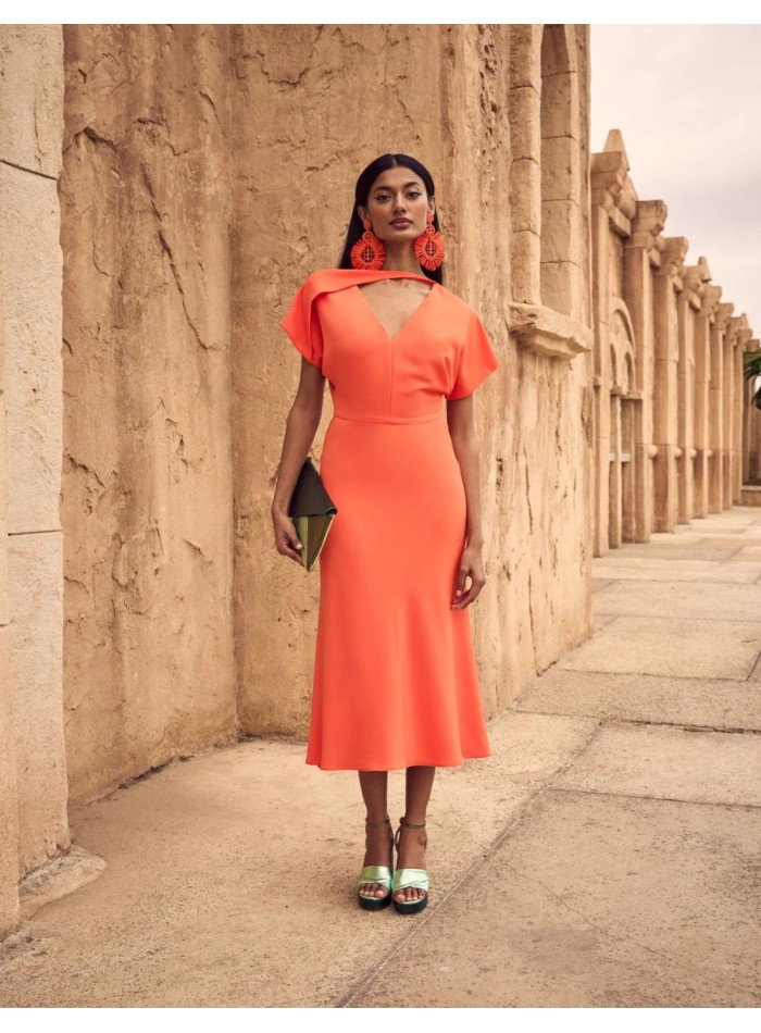 Midi party dress with asymmetric neckline.