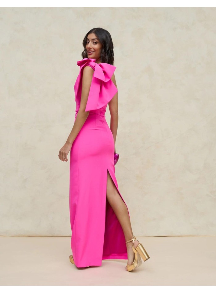 Long pink party dress for guests.