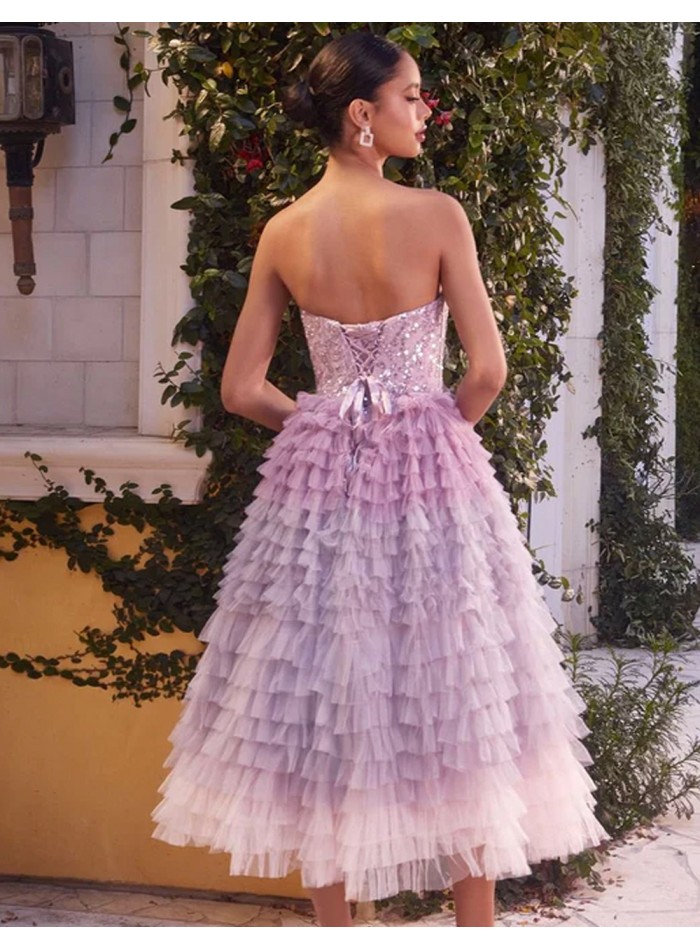 Vestido de fiesta midi con corpiño de pedrería y falda con volantes de tul rosa