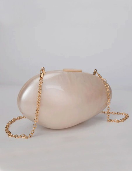Pearlized clutch bag with pearl effect