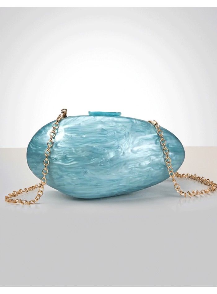 Pearlized clutch bag with pearl effect
