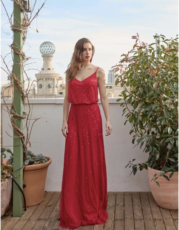 Vestido de fiesta largo de pedrería y escote en la espalda