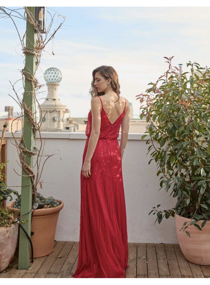 Robe de soirée longue avec strass et décolleté...