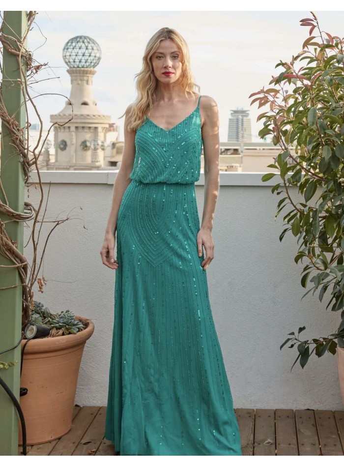 Robe longue de fête avec perles et décolleté dans le dos