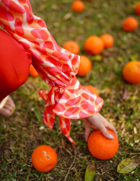 Blusa de fiesta estampada de manga larga con lazada