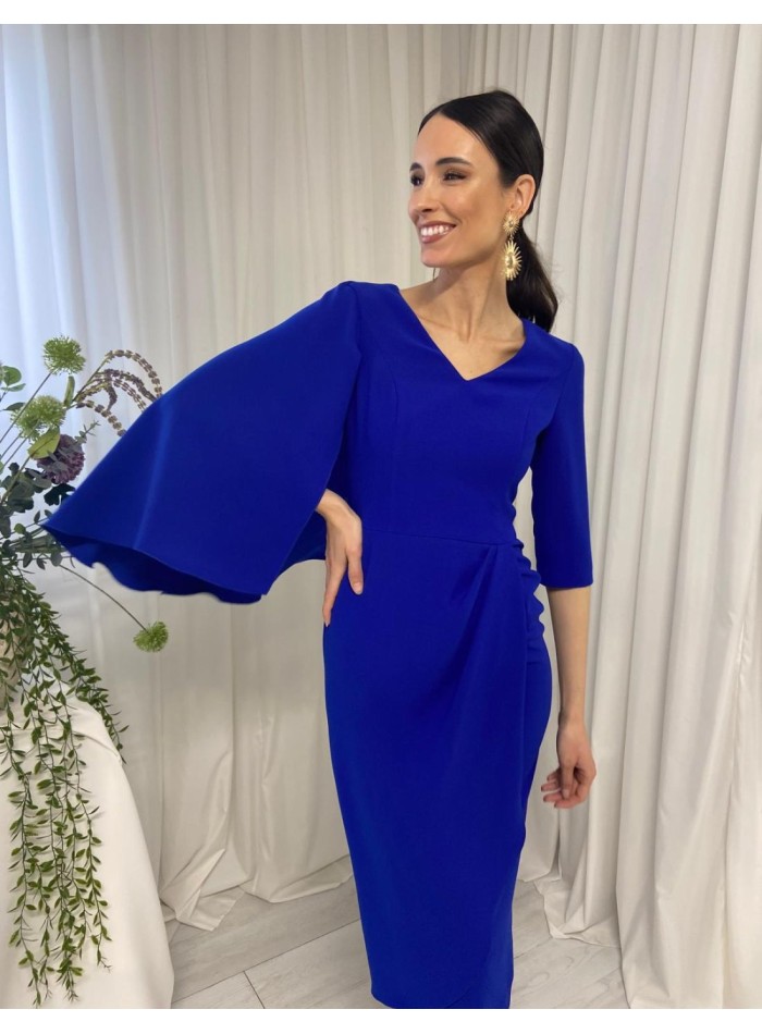 Cocktail dress with asymmetric french sleeves and cape