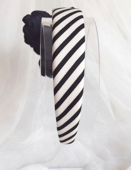 Striped headband with black flower appliqué with feathers