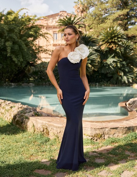 Long knitted party dress with maxi flower details Long knitted party dress with maxi flower details
