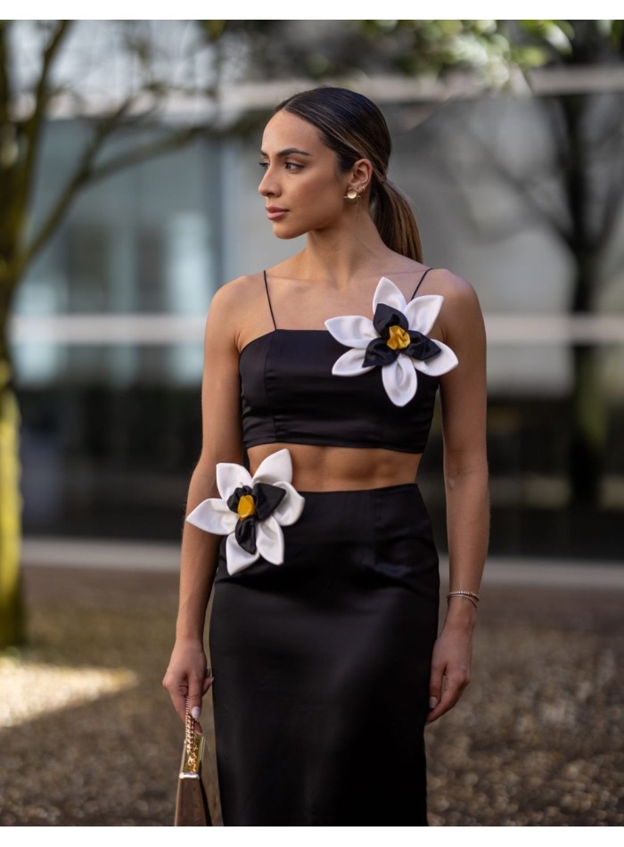Black party crop-top with thin straps and floral decoration