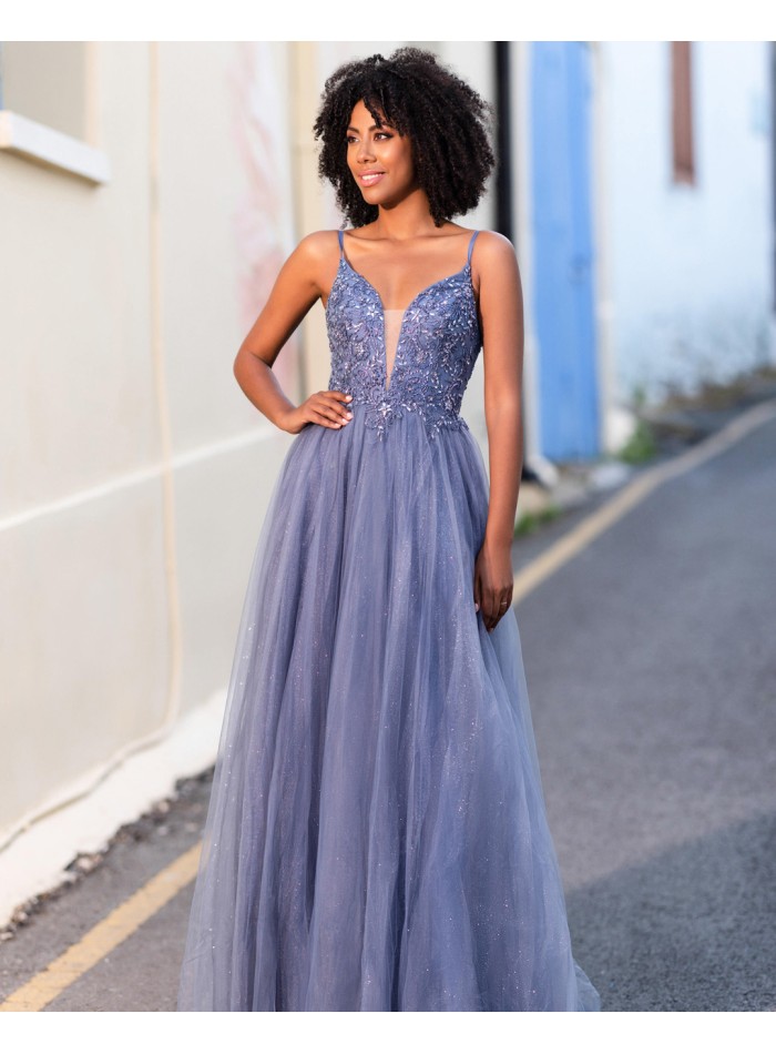 Long party dress with tulle skirt, beaded bodice and open back.