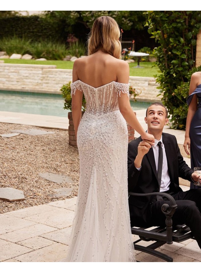Long wedding dress with bardot neckline and...