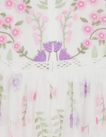 Long white dress in tulle embroidered with flowers