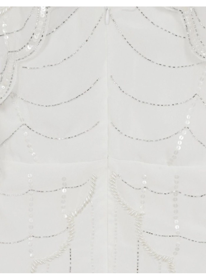 White wedding dress with raised sleeves and...