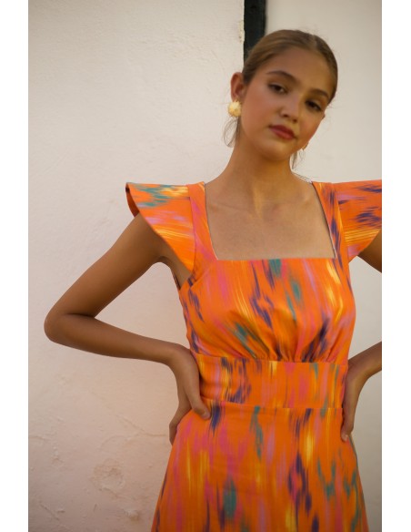 Vestido de invitada midi en lino estampado en naranja para eventos