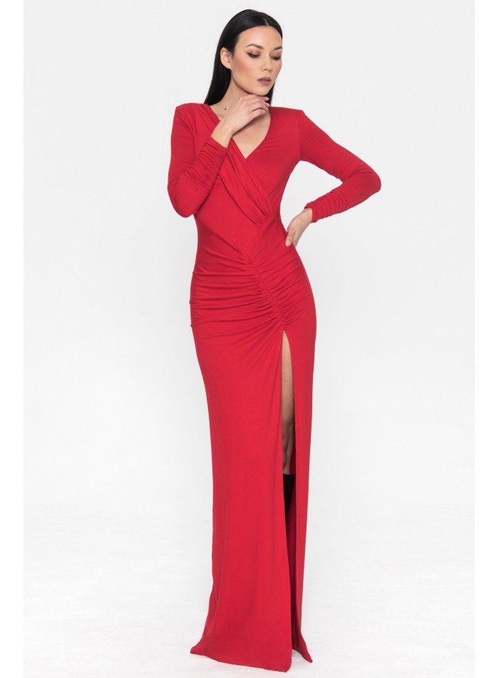 Long red party dress with long sleeves and a slit in the skirt