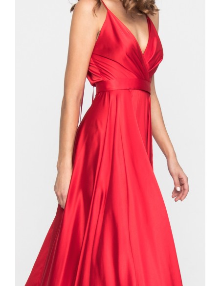 Long red party dress with spaghetti straps and flounced skirt