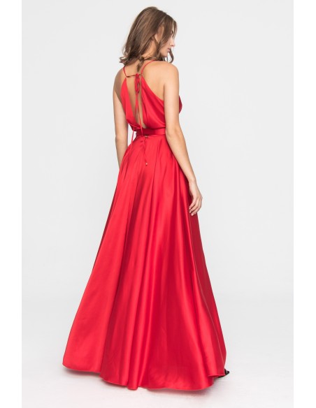 Long red party dress with spaghetti straps and flounced skirt
