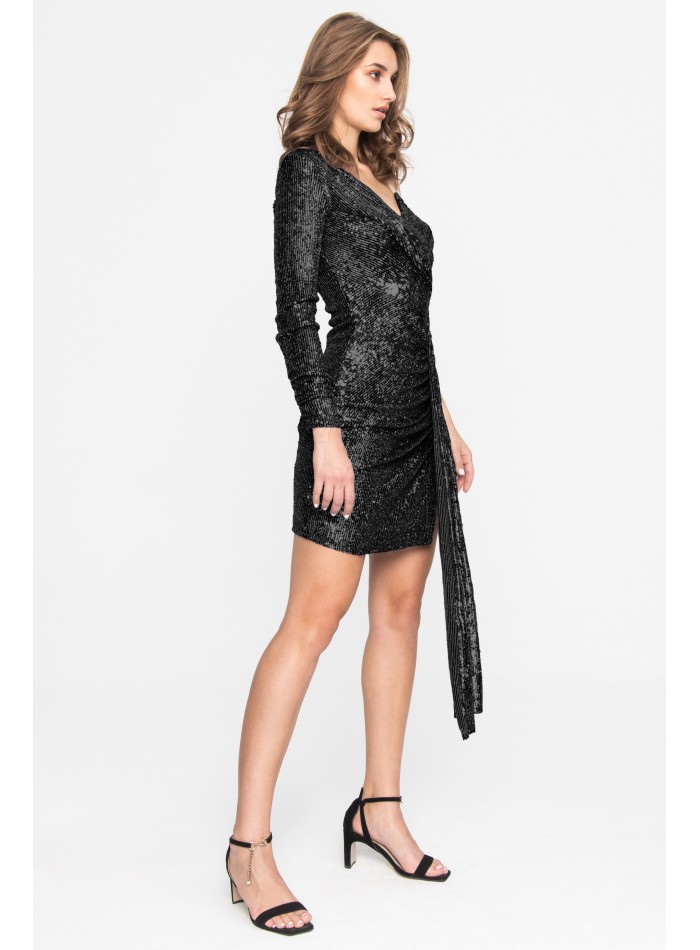 Asymmetrical mini dress with slit and sequins...