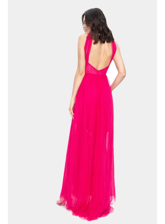 Fuchsia long dress with halter neckline and...