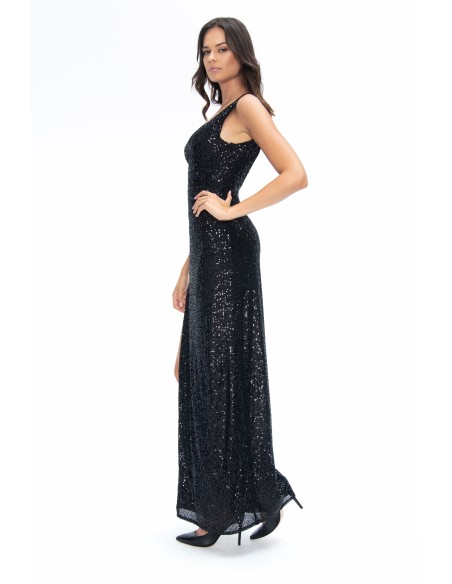 Robe noire moulante à sequins avec fente au niveau des jambes, décolleté en V et dos ouvert