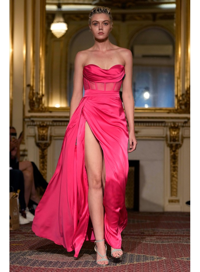 Long pink evening dress with high neckline and high leg slit