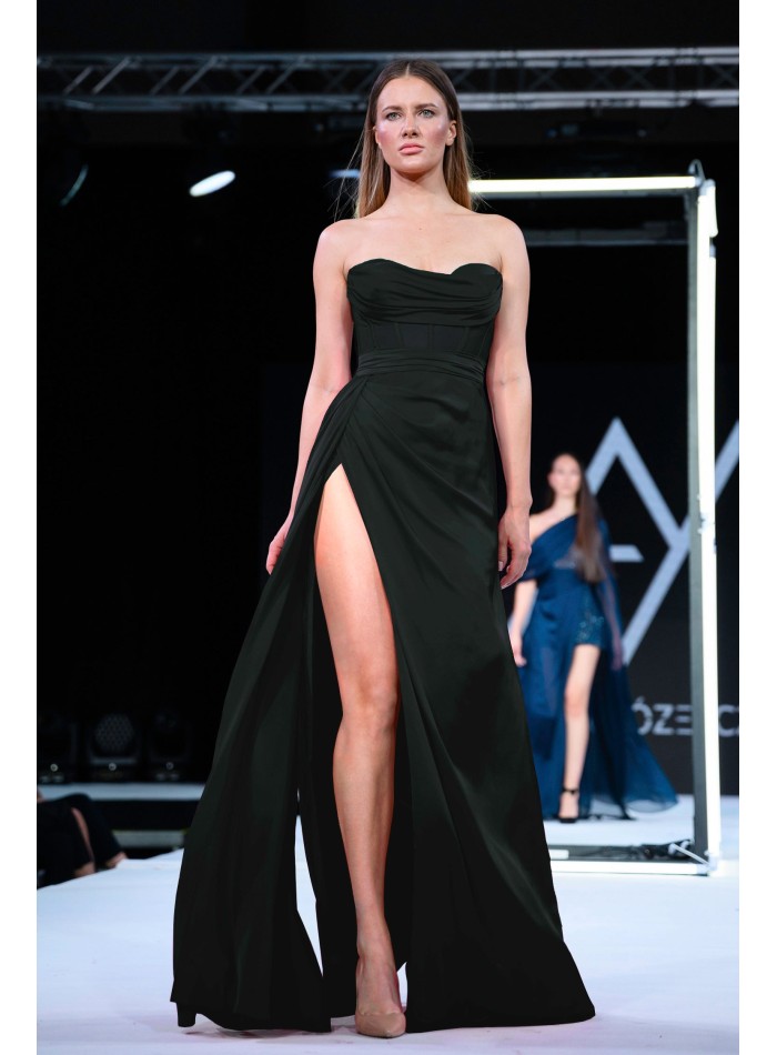 Long black evening dress with high neckline and high leg slit