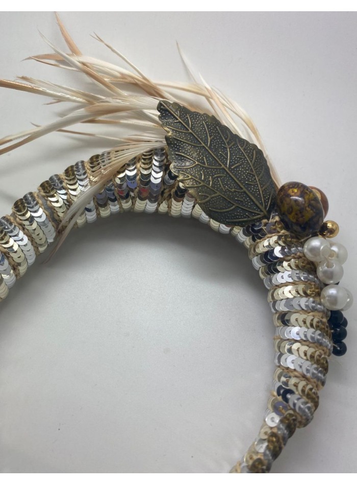 Serre-tête de fête avec des sequins dorés et...