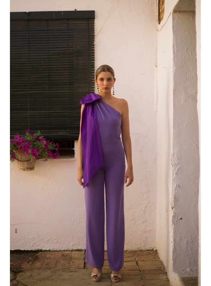 Purple long party jumpsuit with maxi lacing on...