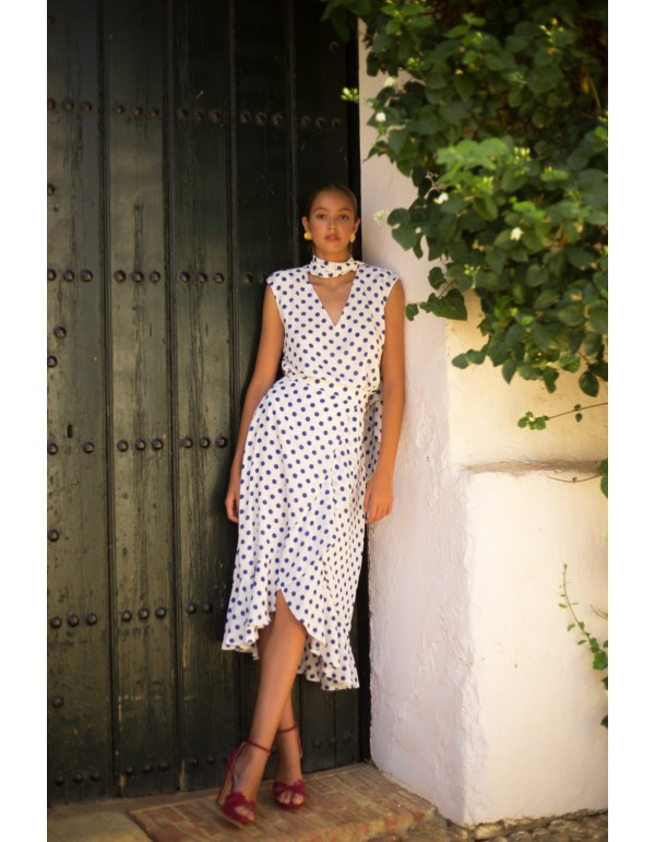 Conjunto top y falda cruzada con volante de lunares