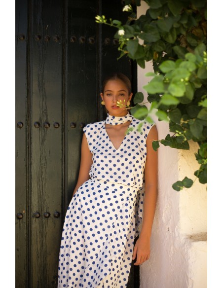 Conjunto top y falda cruzada con volante de lunares