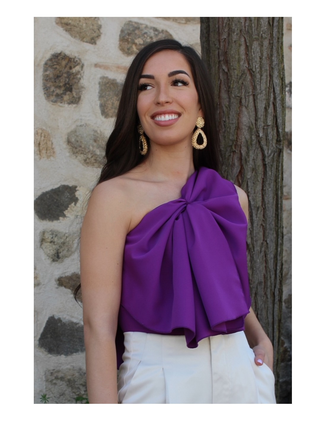 Purple party blouse with asymmetrical neckline and maxi bow