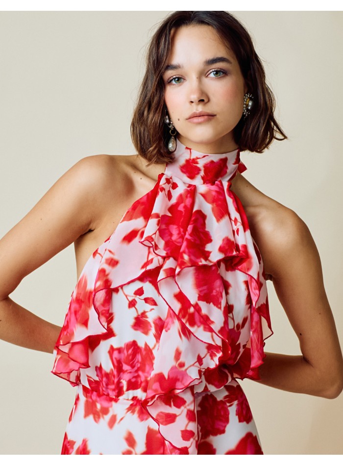 Gown party dress with halter neckline and open back print